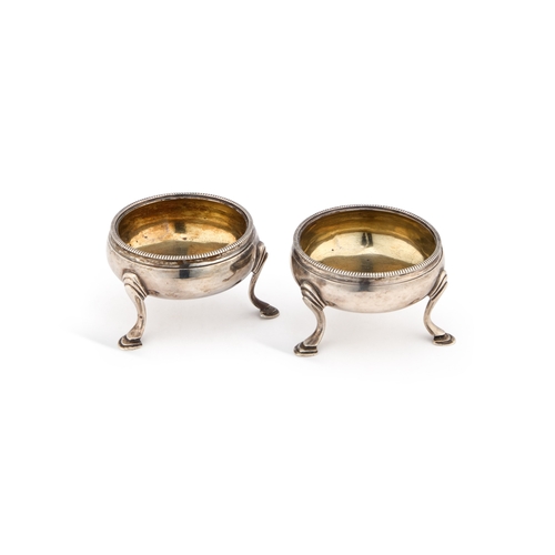 324 - A PAIR OF GEORGE III SILVER SALTS by Peter & Ann Bateman, London 1796, circular. (2) 6cm diamete... 