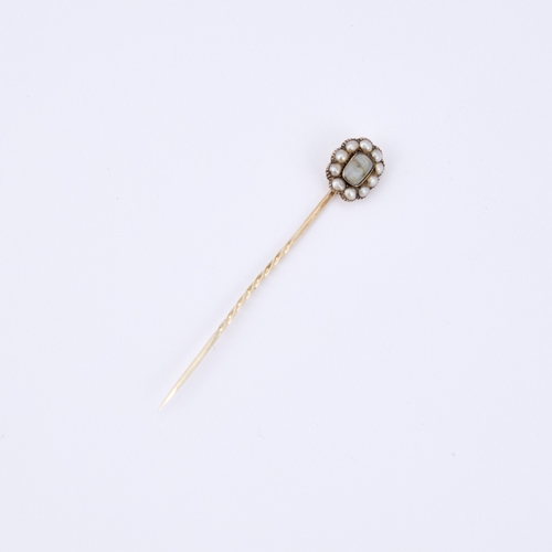 345 - A GEORGIAN LOVER'S EYE PORTRAIT MINIATURE STICK PIN the oval panel depicting the eye of a lady, with... 