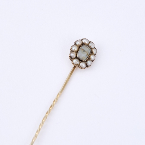 345 - A GEORGIAN LOVER'S EYE PORTRAIT MINIATURE STICK PIN the oval panel depicting the eye of a lady, with... 