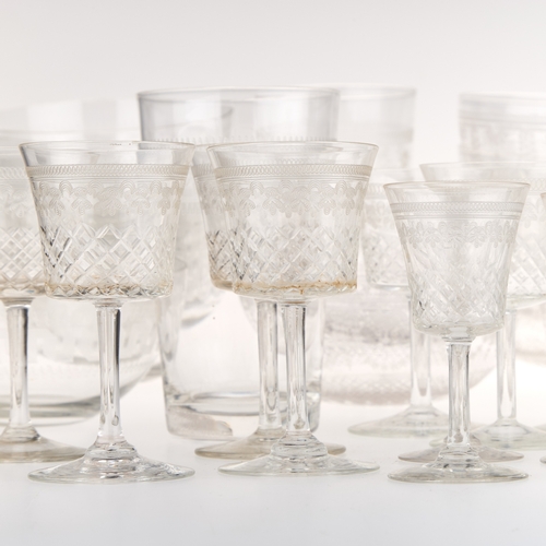 38 - A COLLECTION OF EARLY 20TH CENTURY ETCHED DRINKING GLASSES AND FINGER BOWLS (Two trays)