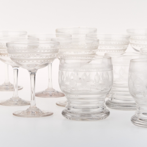 38 - A COLLECTION OF EARLY 20TH CENTURY ETCHED DRINKING GLASSES AND FINGER BOWLS (Two trays)