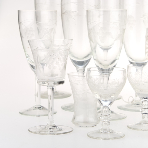 51 - A COLLECTION OF ETCHED AND CUT DRINKING GLASSES (Two trays)