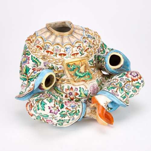 87 - A 19TH CENTURY CONTINENTAL PORCELAIN PAGODA FIGURE BASE IN MEISSEN STYLE modelled seated cross-legge... 