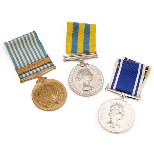 20 - AN ELIZABETH II KOREA MEDAL AND POLICE LONG SERVICE AND GOOD CONDUCT (L.S.G.C) MEDAL GROUP comprisin... 