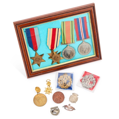 30 - A GROUP OF MILITARIA including a Royal Flying Corps (RFC) silver sweetheart brooch; a Royal Naval Pa... 