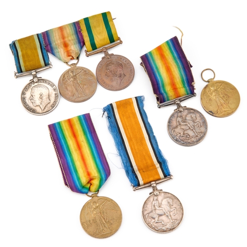 32 - THREE FIRST WORLD WAR MEDAL GROUPS comprising two pairs comprising War Medal and Victory Medal, awar... 