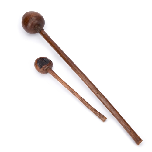 50 - TWO ZULU KNOBKERRIES each with a globular head and cylindrical shaft. (2) Longest 78cm