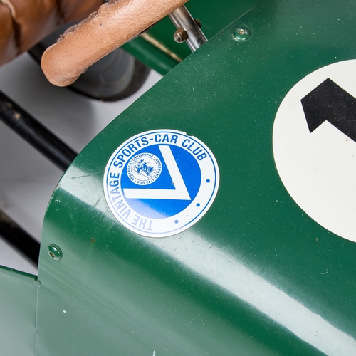 53 - A VINTAGE BAGHERA âAUSTINâ PEDAL CAR painted dark green with racing number â1â, fitted with ... 