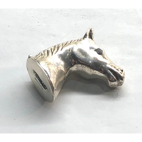 556 - Hallmarked silver horses head vesta case jewelled eyes measures approx 44mm by 38mm