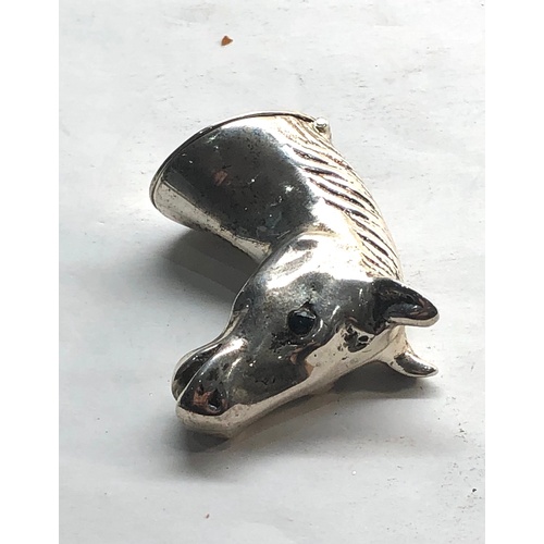 556 - Hallmarked silver horses head vesta case jewelled eyes measures approx 44mm by 38mm