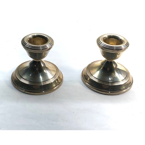 565 - Pair of vintage squat candle sticks Birmingham silver hallmarks