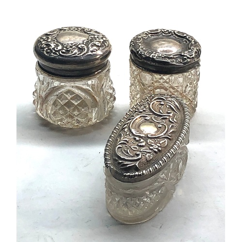 568 - 3 Antique silver top and glass jars