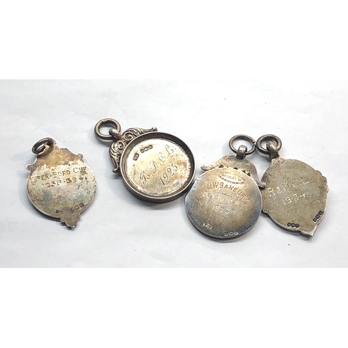 579 - 4 Vintage hallmarked silver fobs