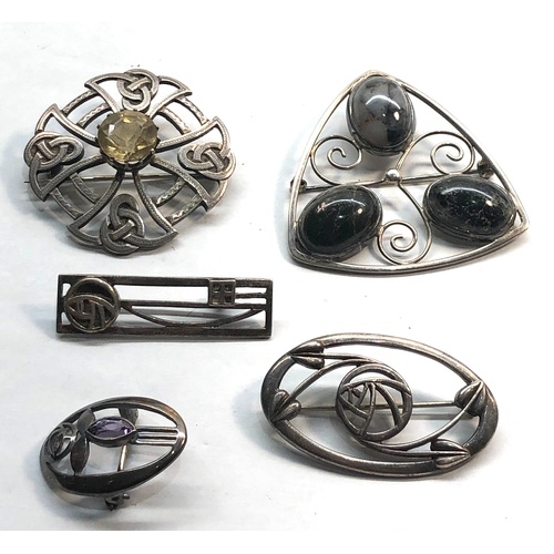 25 - 5 Silver celtic brooches