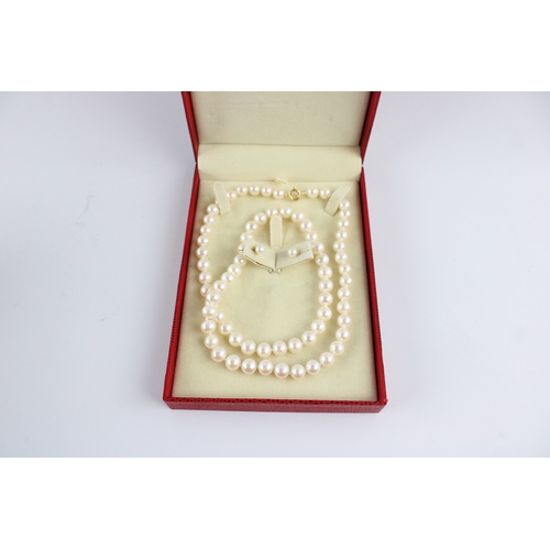 61 - Quality blush pearl necklace and earring set in 18ct gold, Length of necklace approximately 24 inche... 