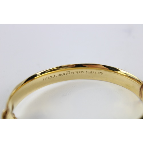 63 - Vintage rolled gold bangle w/ floral engraving