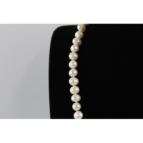 64 - Baroque white pearl rope necklace