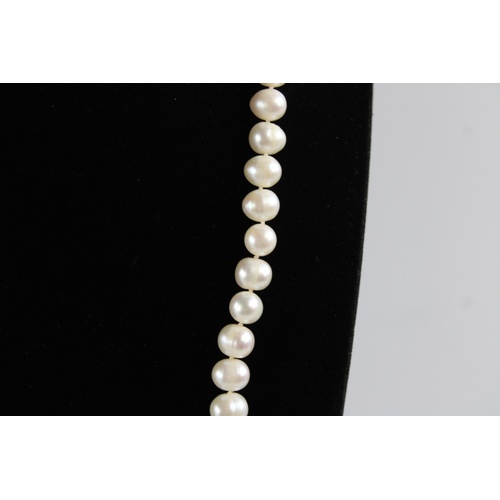 64 - Baroque white pearl rope necklace