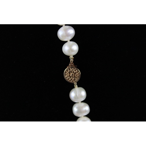 64 - Baroque white pearl rope necklace