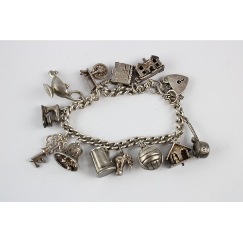 75 - Vintage sterling silver charm bracelet