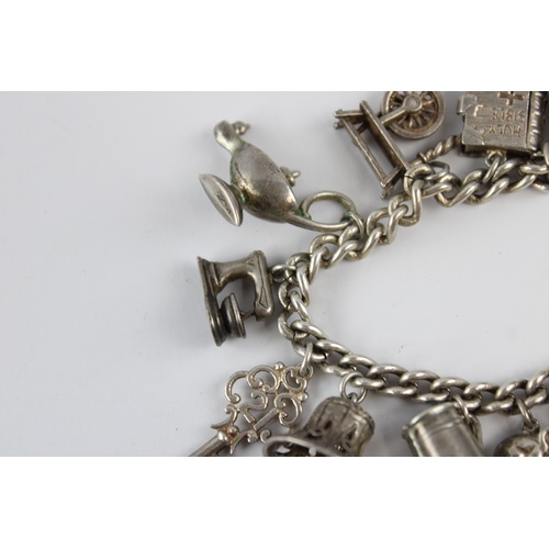 75 - Vintage sterling silver charm bracelet