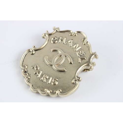 76 - Vintage Chanel brooch, approximate measurements: 38mm by 32mm