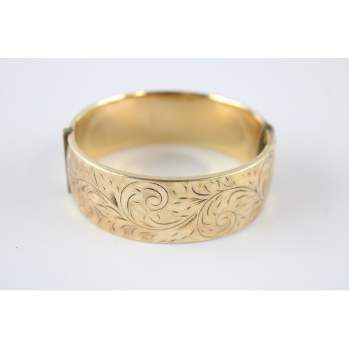 84 - Vintage 9ct gold metal core cuff bangle (53g)