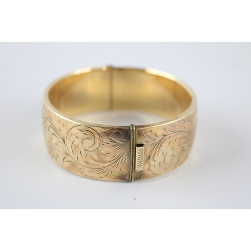 84 - Vintage 9ct gold metal core cuff bangle (53g)