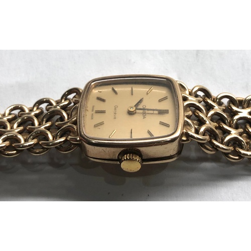 531 - 9ct gold ladies Omega Geneve wristwatch and strap total weight 33g watch winds and ticks but no warr... 