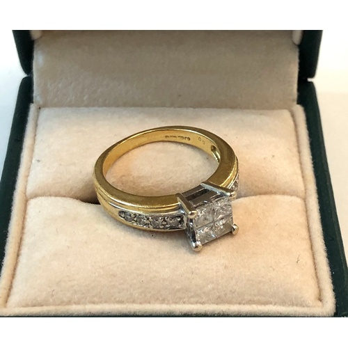 538 - 18ct gold diamond ring set with 4 baguette diamonds each measures approx 3mm sq with 4 diamonds each... 