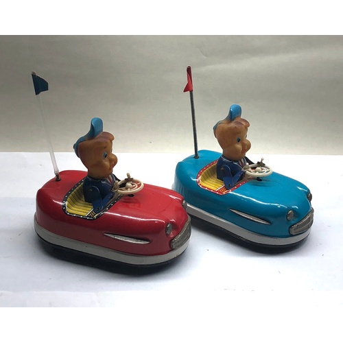 1089 - Pair of vintage wind up Japanese tin toys