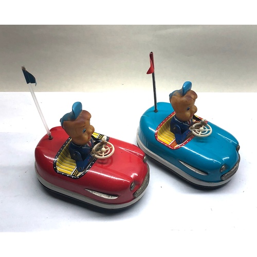 1089 - Pair of vintage wind up Japanese tin toys