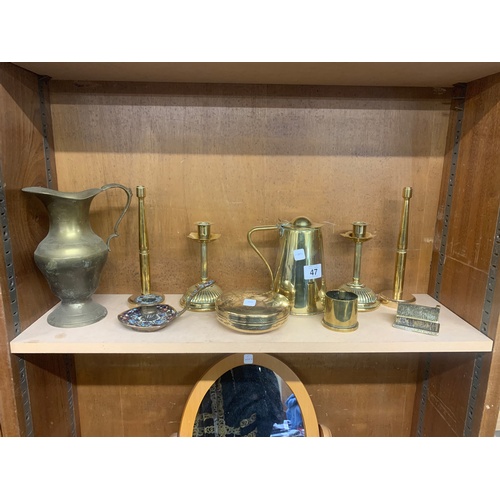 47 - Shelf of brassware