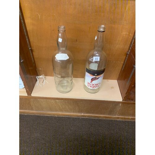 69 - 2 Large whiskey bottles