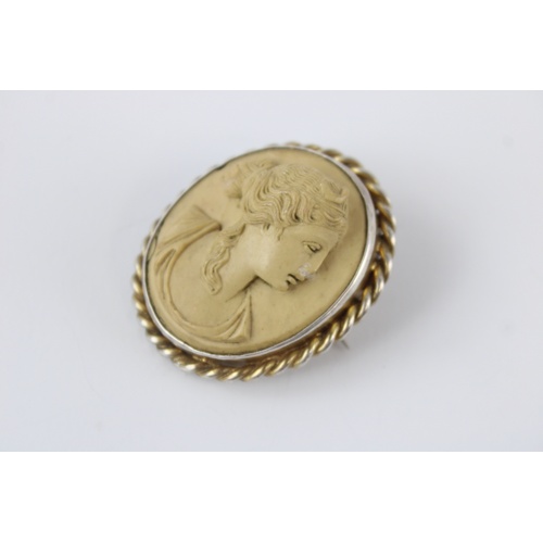 107 - Silver mounted lava cameo brooch (15g)