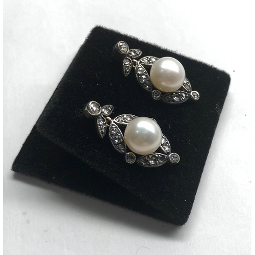 114 - Rose diamond and pearl earrings set with large central pearl that measures approx 9mm dia with rose ... 