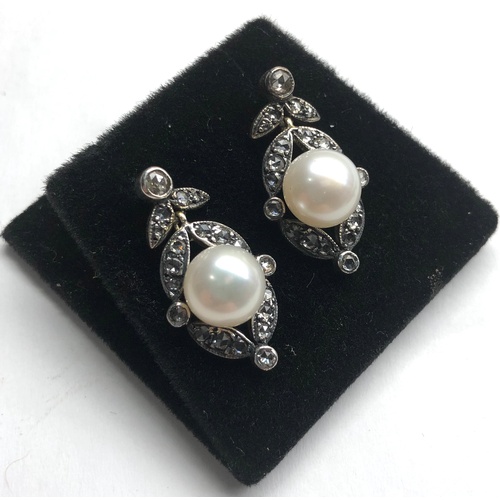 114 - Rose diamond and pearl earrings set with large central pearl that measures approx 9mm dia with rose ... 