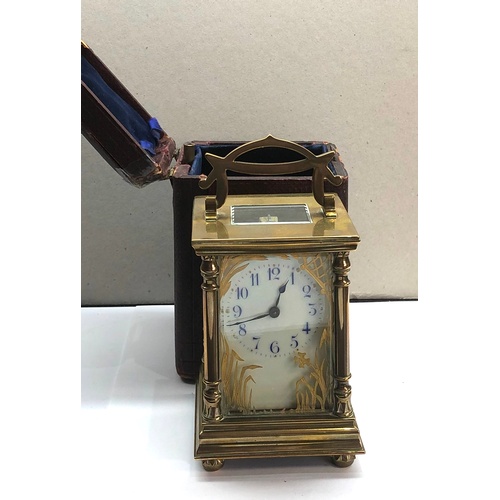 387 - Antique brass carriage clock original box and key clock winds and ticks,  clock height approximately... 