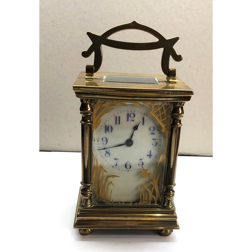 387 - Antique brass carriage clock original box and key clock winds and ticks,  clock height approximately... 