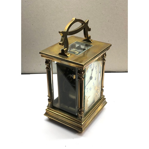 387 - Antique brass carriage clock original box and key clock winds and ticks,  clock height approximately... 