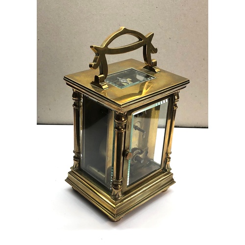 387 - Antique brass carriage clock original box and key clock winds and ticks,  clock height approximately... 