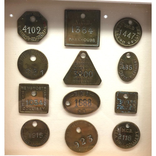 371 - 2 Framed collection of miners pit tokens