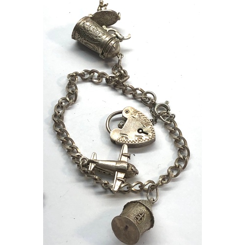 129 - 2 vintage silver charm bracelets