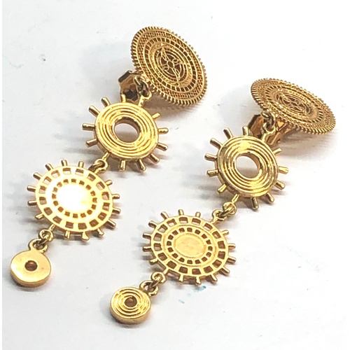 130 - Designer gold tone earrings Chloe