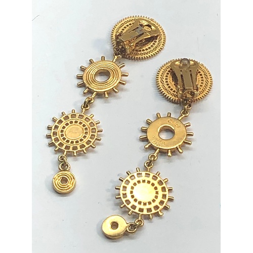 130 - Designer gold tone earrings Chloe