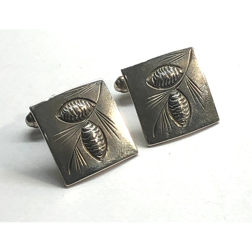 136 - Designer silver cufflinks marked sterling N E set in leaf