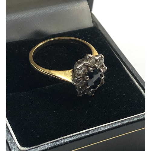 148 - 18ct gold sapphire and diamond ring, the sapphire measures approx 7mm by 6mm the diamonds are approx... 