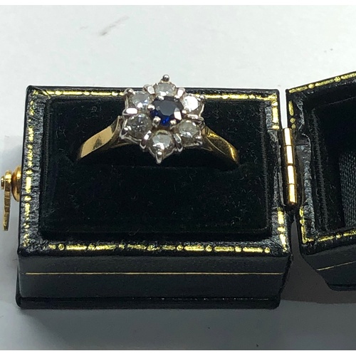 149 - 18ct diamond and sapphire ring