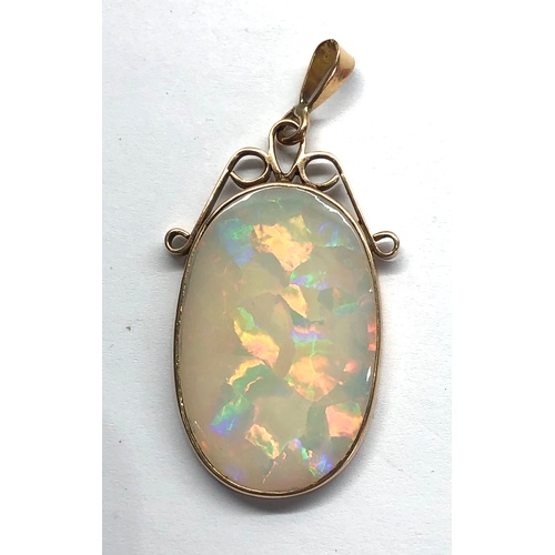 155 - Large gold mounted Opal pendant opal measures approx 37mm by 24mm approx 25ct