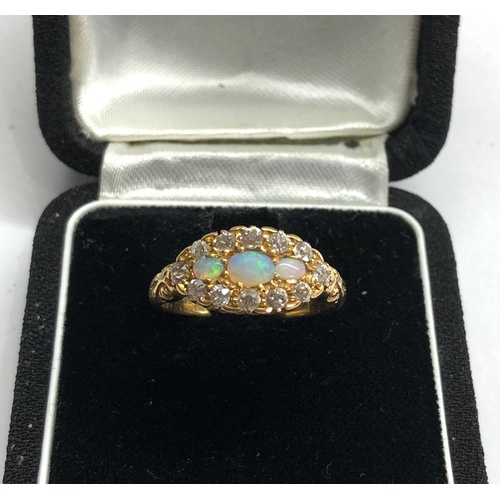 167 - Antique 18ct gold diamond and opal ring